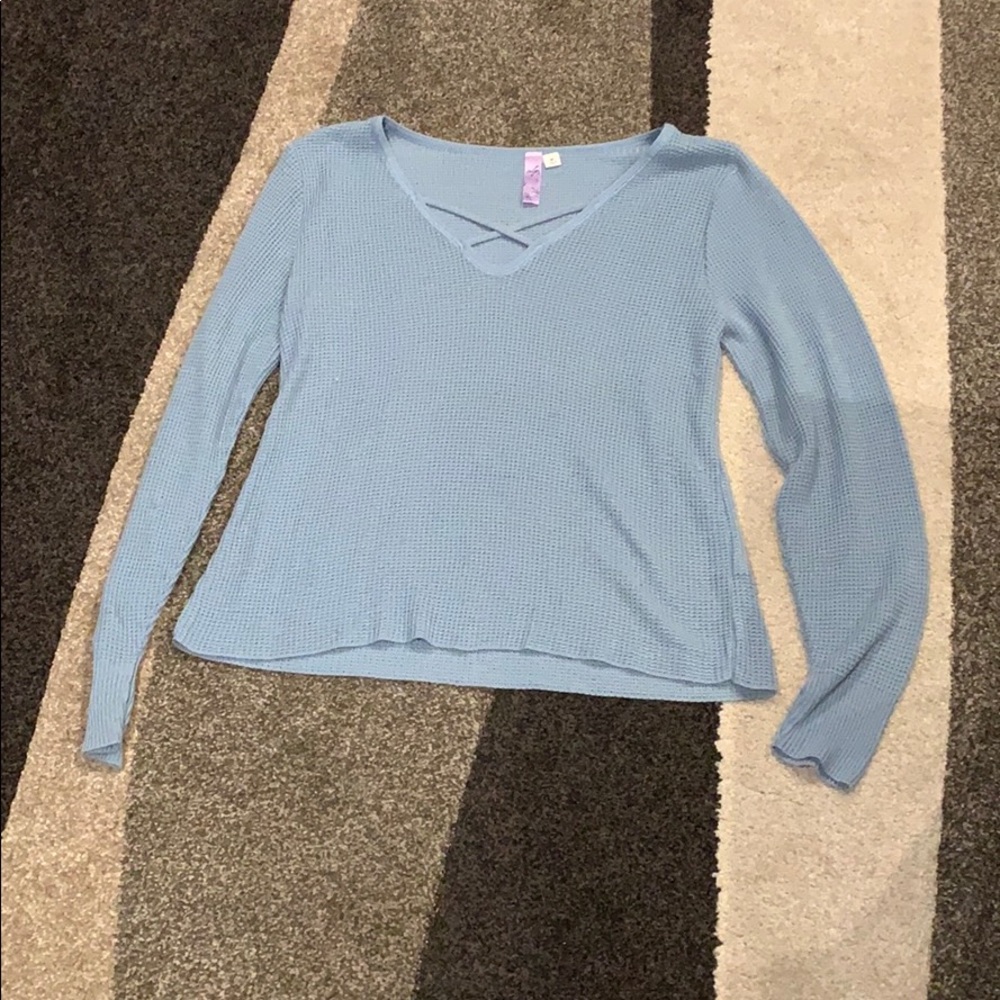 Blue sweater with cross neck